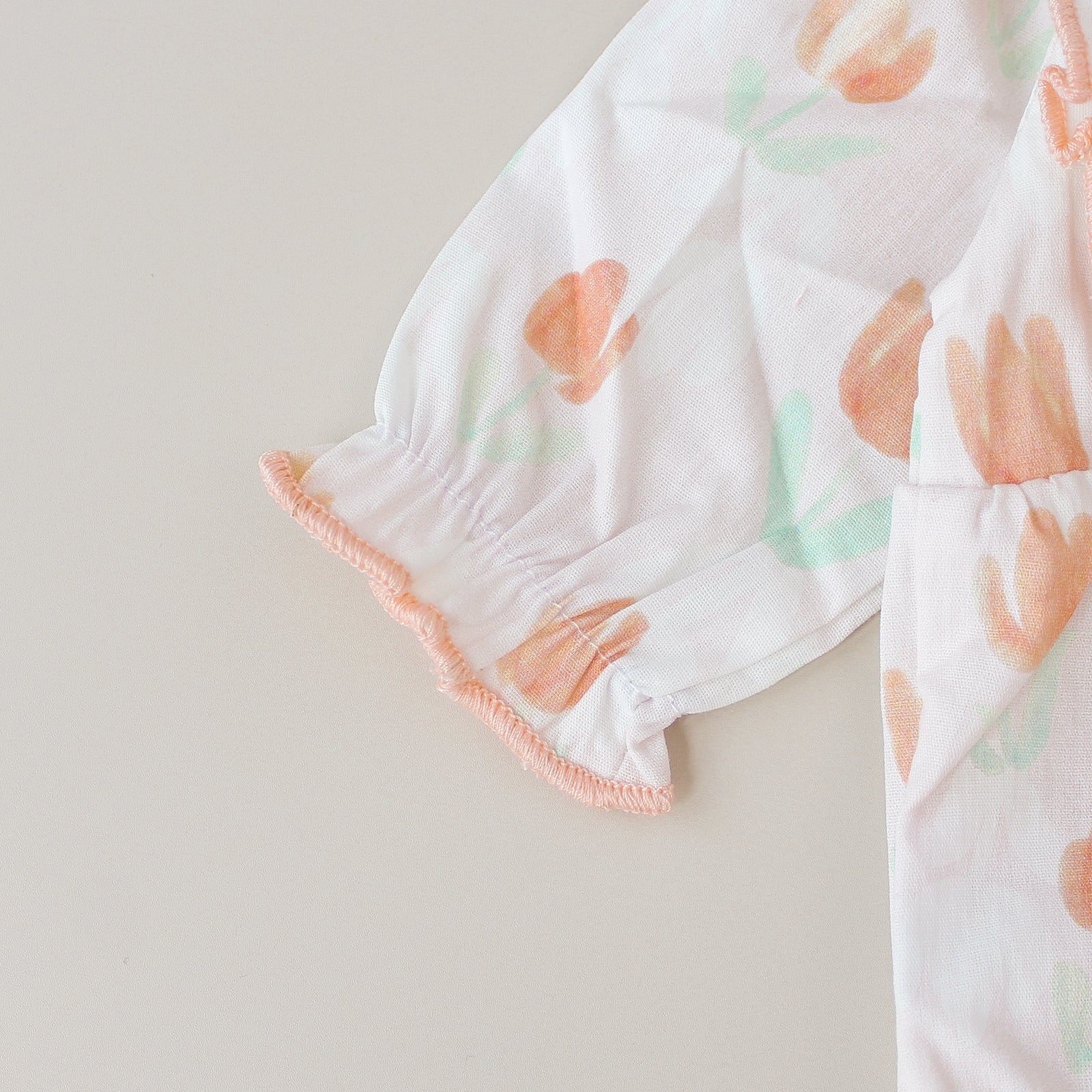 Pelele flores y volantes con lazo – Para bebés reborn de 44 a 52 cm