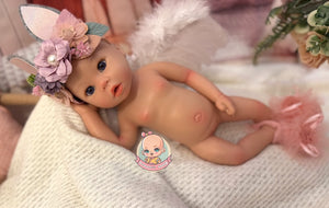 muñeca reborn ojos abiertos económico