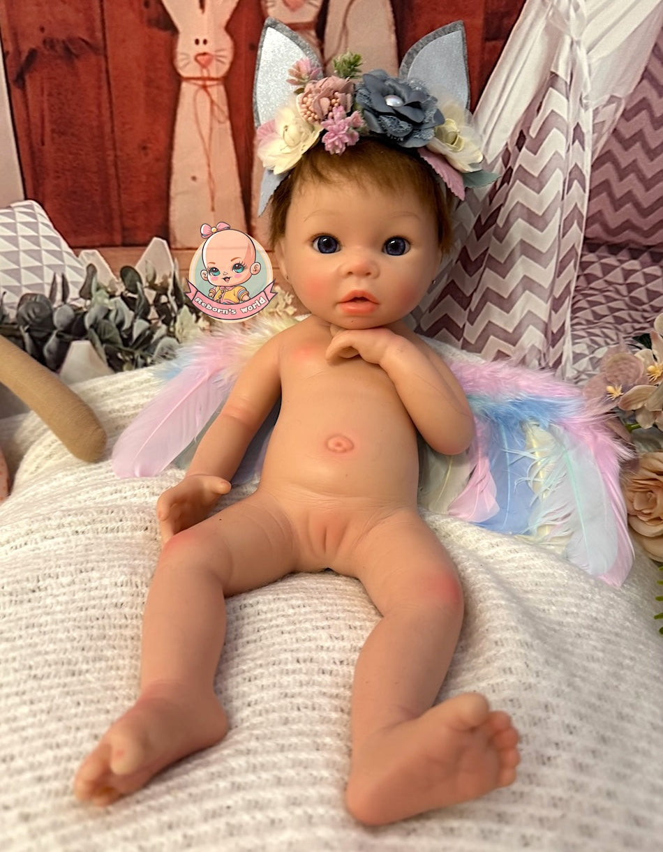 bebe reborn silicona con pelo raiz