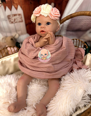 muñeca reborn que se le pueda dar biberon