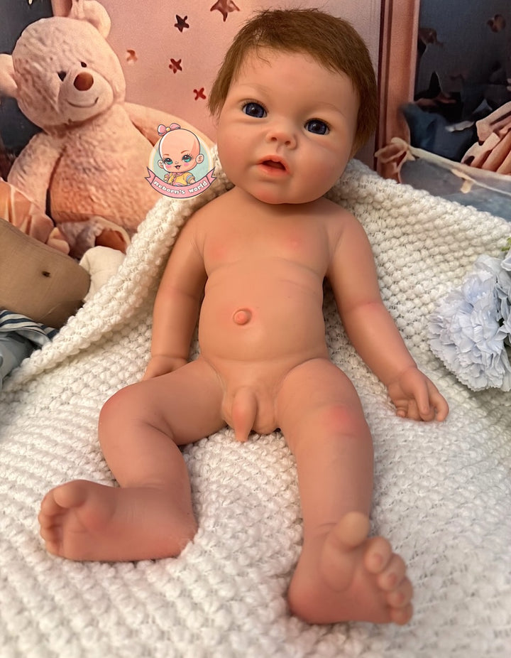 muneca reborn niño sentado Leslie 