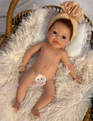 muñeca reborn silicona en cuna Bimba
