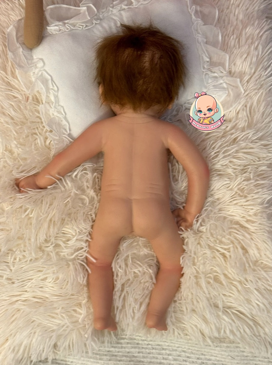 muñeca reborn silicona en cuna tumbada Bimba