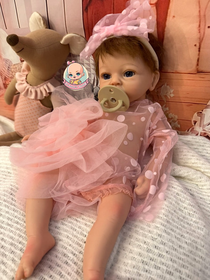 muñeca reborn silicona pelo injertado chupete Noa
