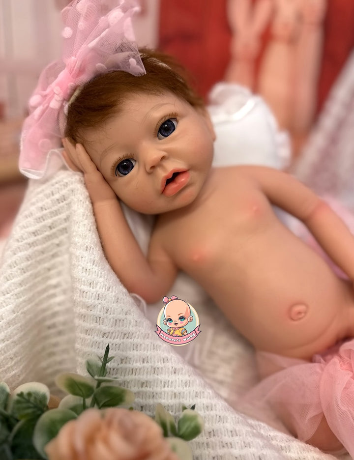 muneca reborn silicona pelo tumbada Noa