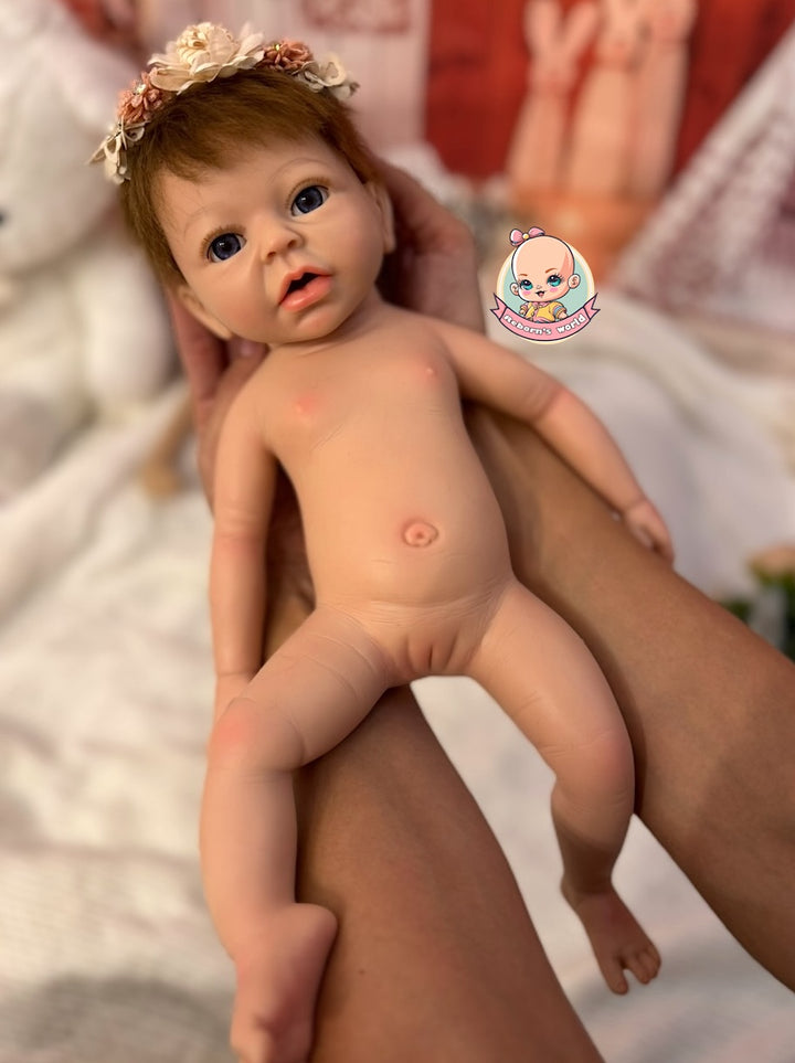 muñeca silicona pelo injertado en brazos Noa