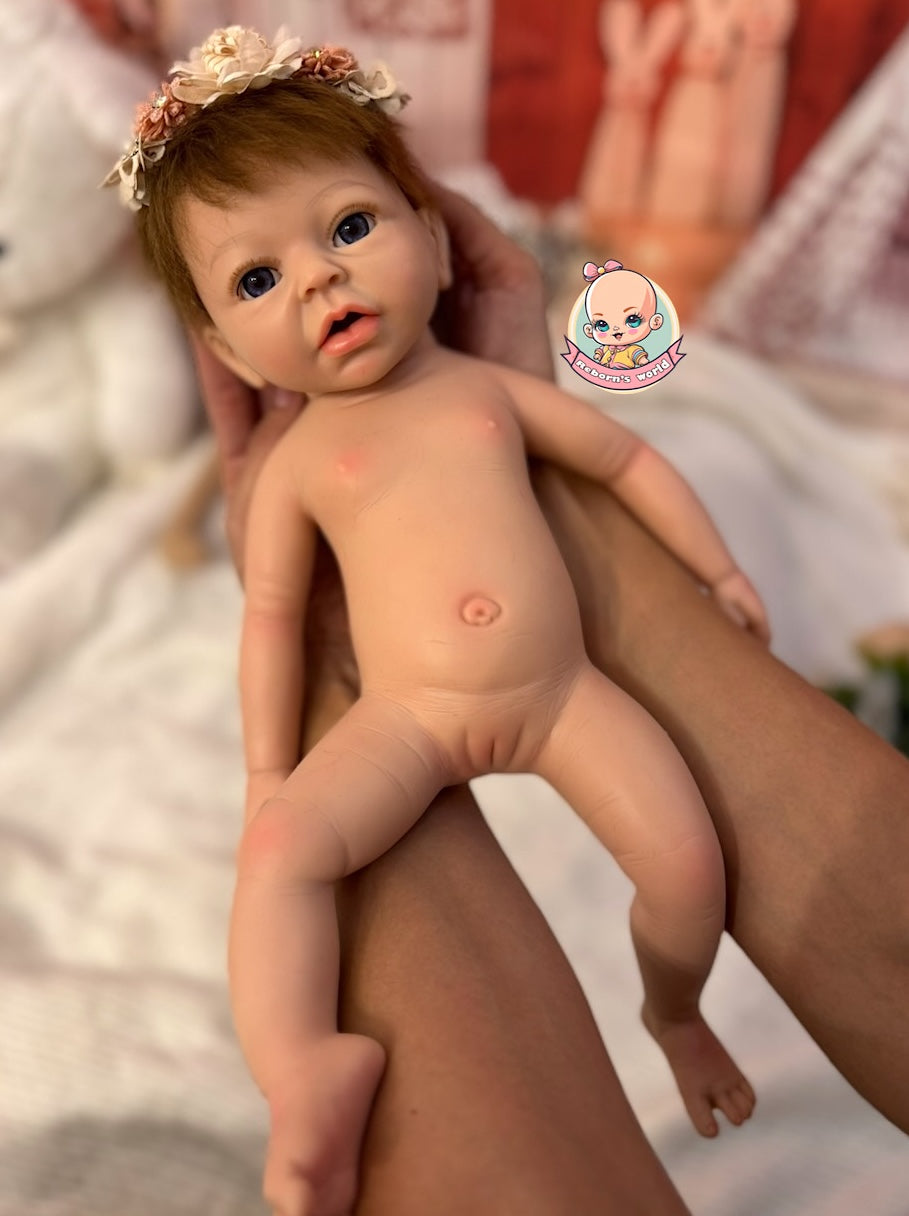 muñeca silicona pelo injertado en brazos Noa