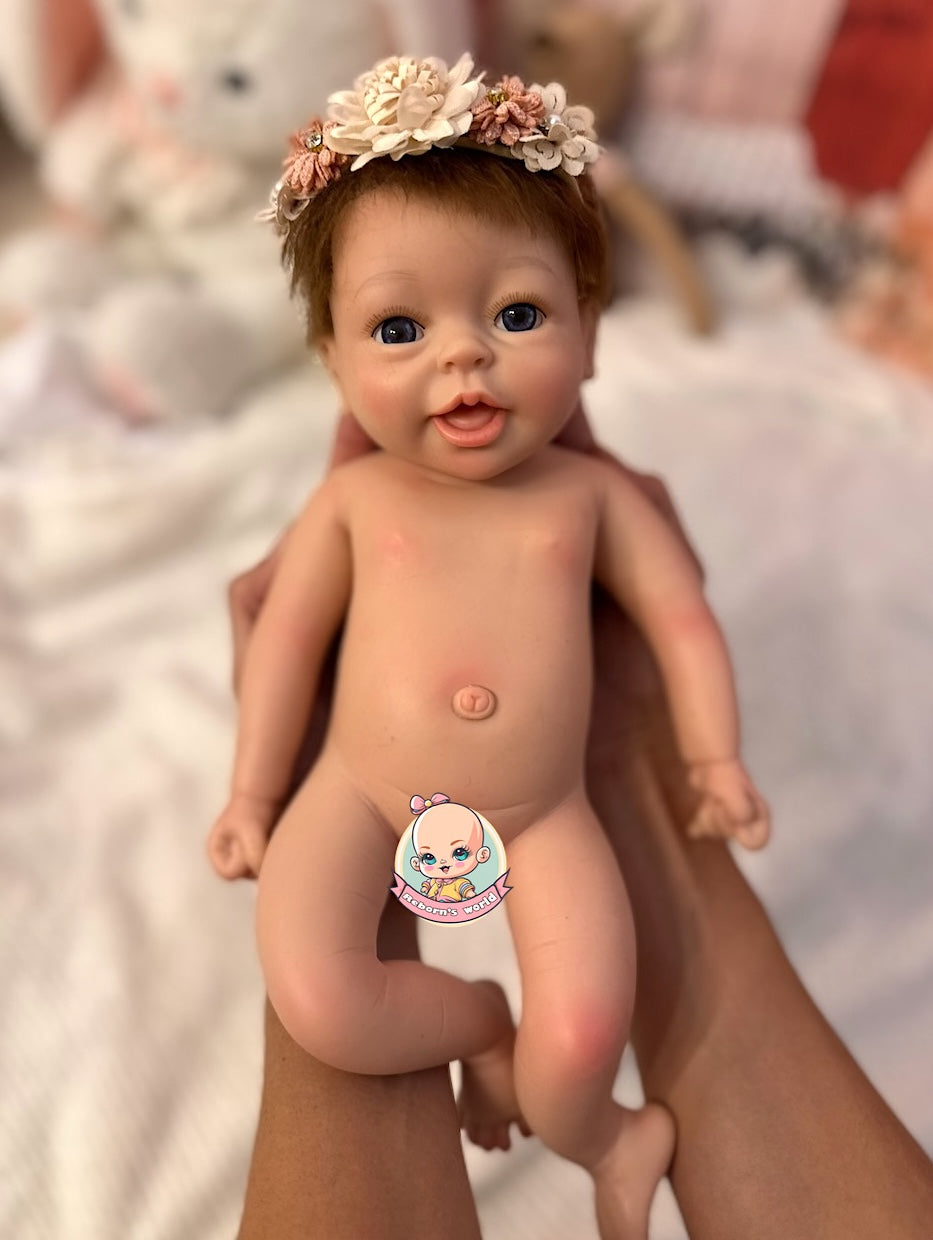 muneca siliona en brazos bimba