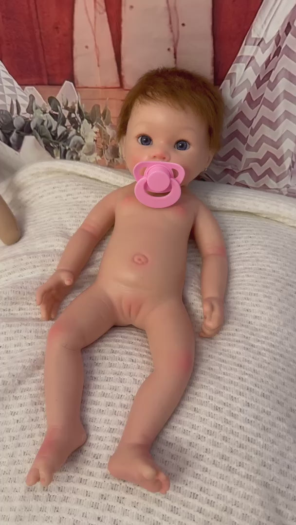 bebe reborn con pelo natural